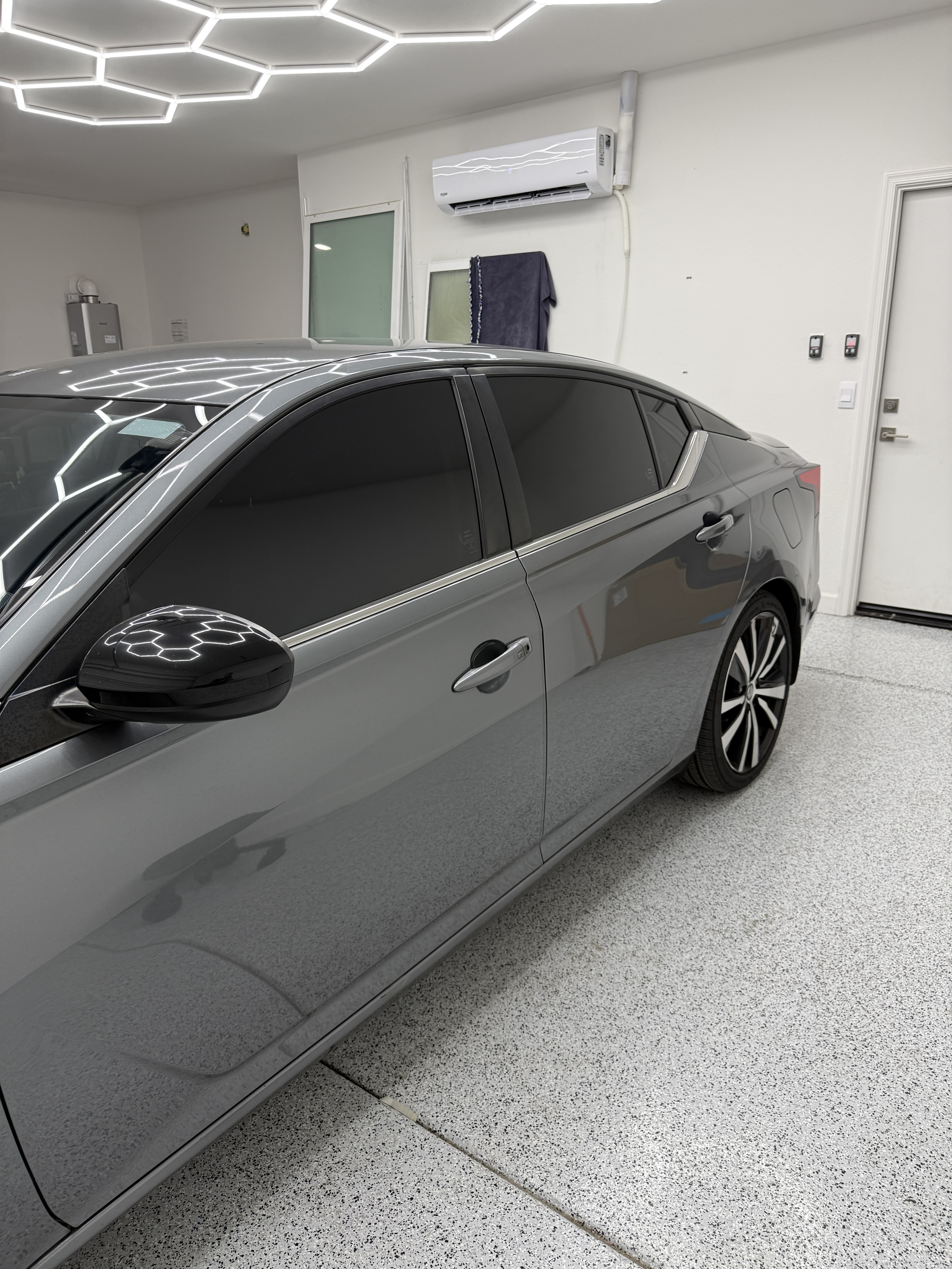 ceramic-window-tint-dark-side-glass-installation