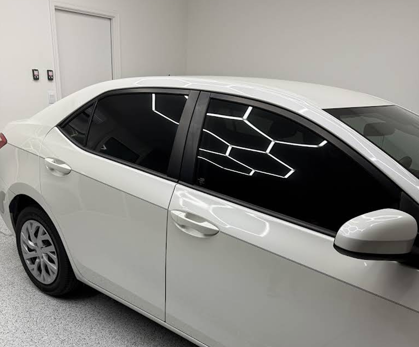 white-toyota-corolla-dark-window-tint